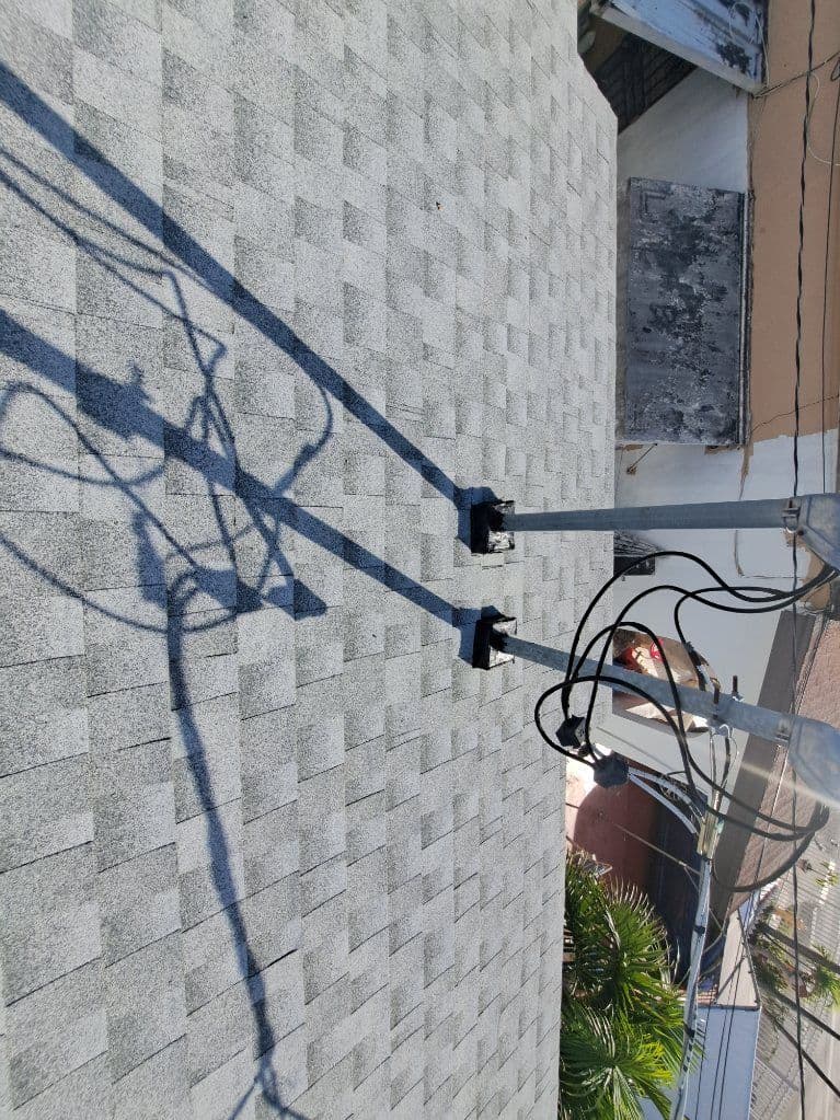 Gallery photos for Enhancing Home Protection with Light Gray TAMKO Shingles: Image #1